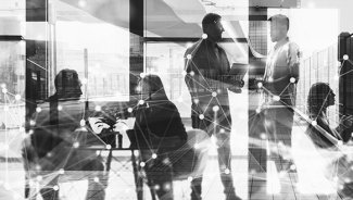 People working connected by technology