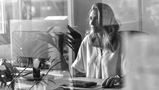woman on computer transferring files