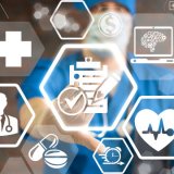 Header Image: HITRUST Icons In Front of Doctor